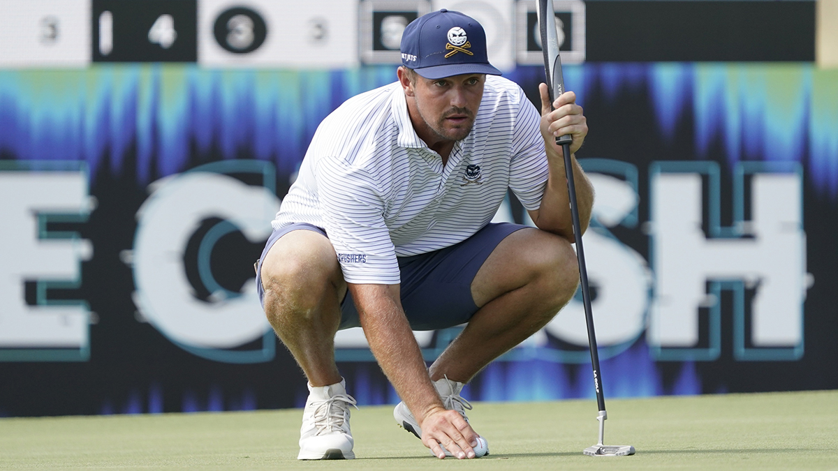 Bryson DeChambeau of the Crushers GC lines up a putt on the 15th green during the LIV Golf Dallas Team Championship Semifinals at Maridoe Golf Club.