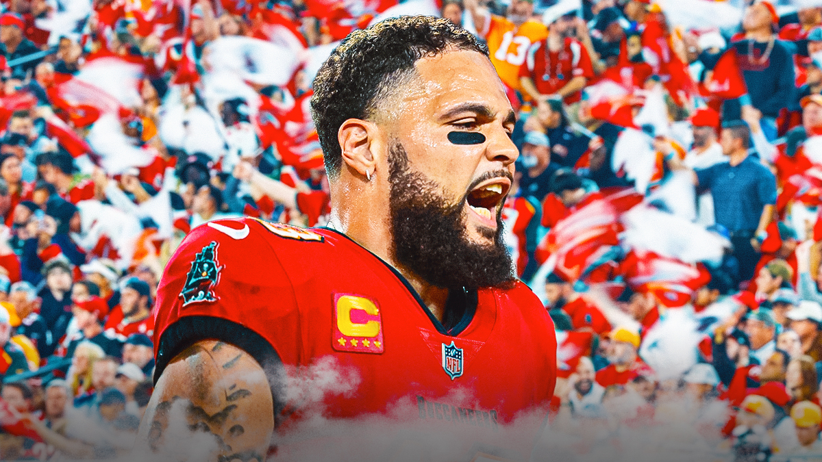 Tampa Bay Buccaneers wide receiver Mike Evans celebrating in center, Tampa Bay Buccaneers fans celebrating on left and right sides, Raymond James Stadium (home stadium of the Tampa Bay Buccaneers) in background