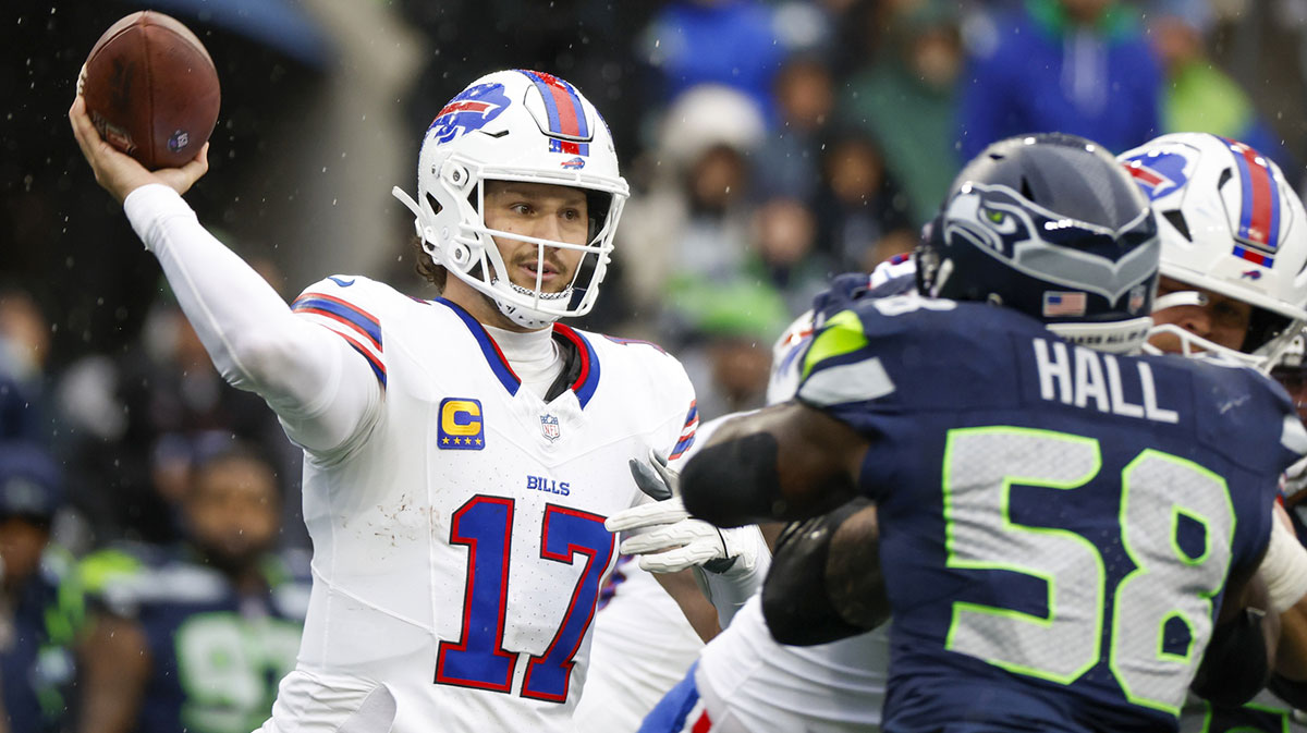 Buffalo Bills quarterback Josh Allen (17) passes against the Seattle Seahawks during the second quarter at Lumen Field. 