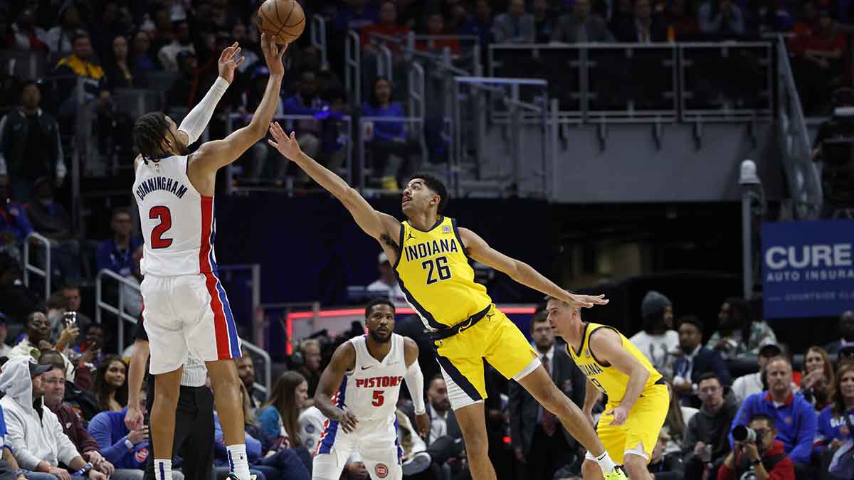 Detroit Pistons guard Cade Cunningham (2) shoots over Indiana Pacers guard Ben Sheppard (26) in the second half at Little Caesars Arena. The Pistons also received a technical foul after fielding six players on the court in an inbounds play.