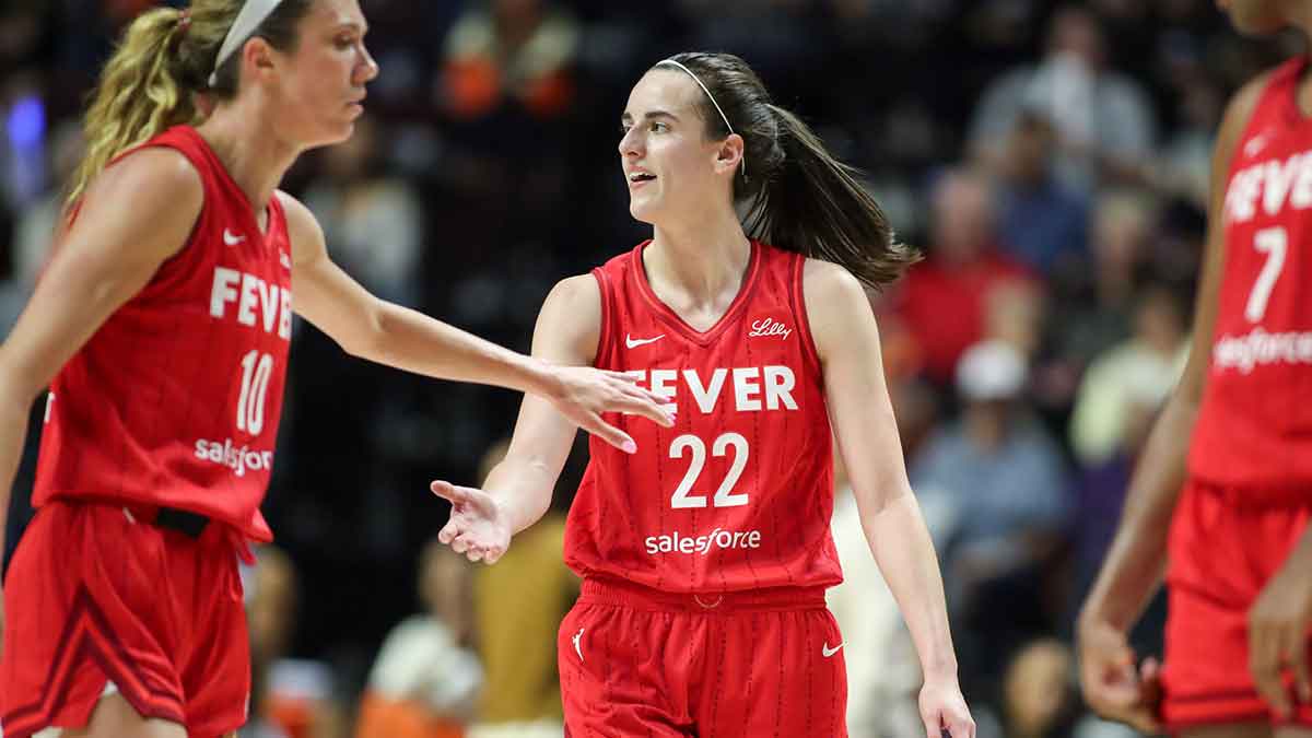 Sep 25, 2024; Uncasville, Connecticut, USA; Indiana Fever guard Caitlin Clark (22) reacts during the second half against the Connecticut Sun during game two of the first round of the 2024 WNBA Playoffs at Mohegan Sun Arena. Mandatory Credit: Paul Rutherford-Imagn Images