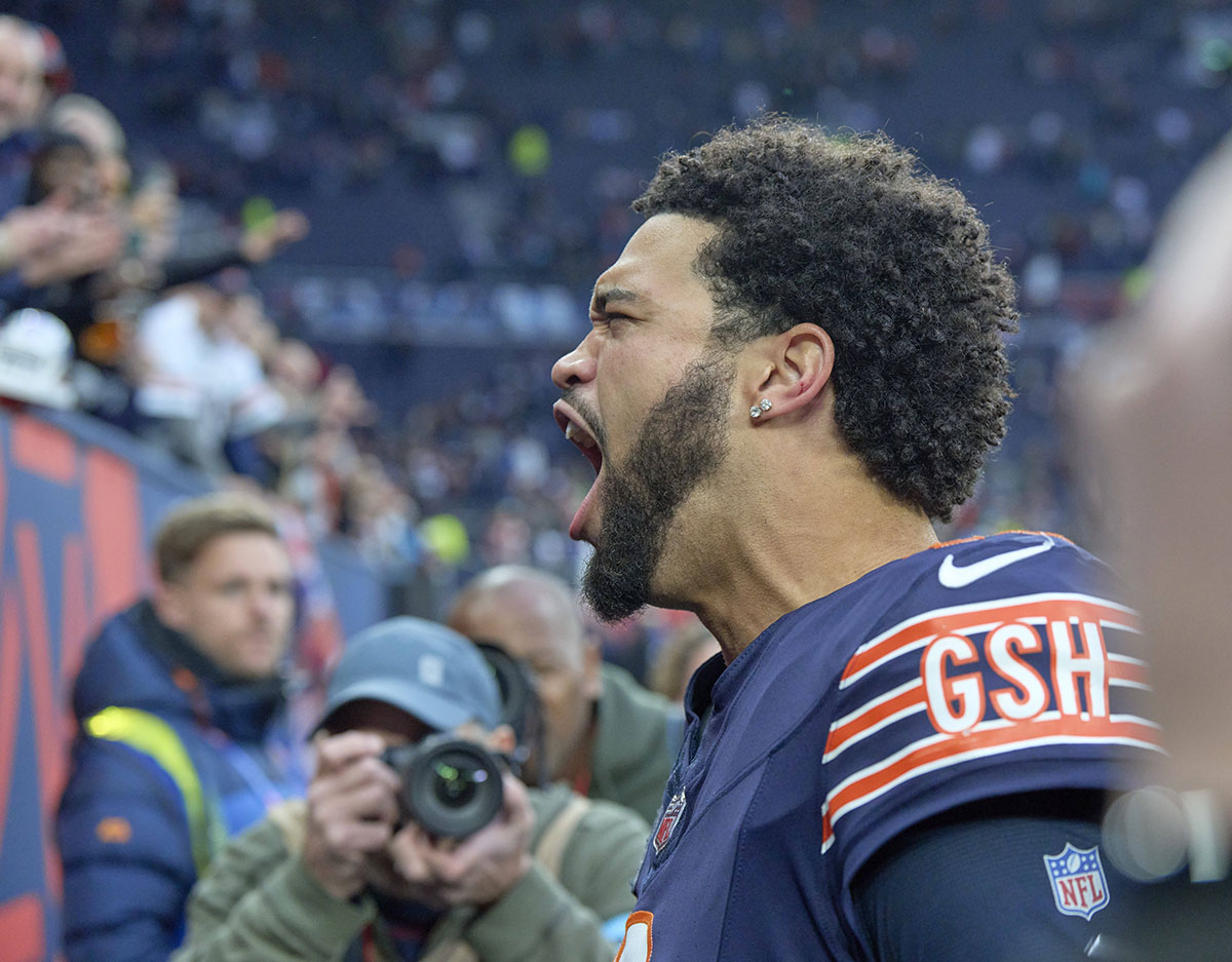 Chicago Bears quarterback Caleb Williams (18) reacts with fans after the second half of an NFL International Series game at Tottenham Hotspur Stadium.