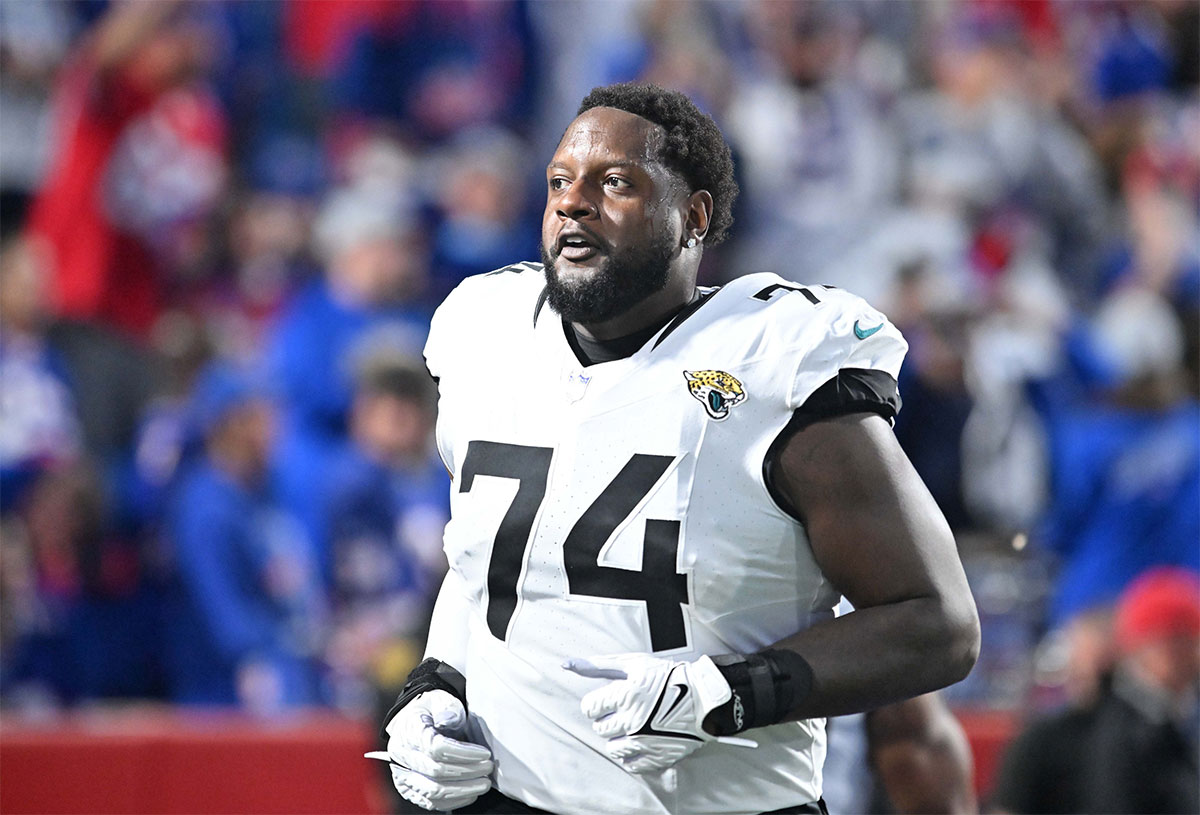 Jacksonville Jaguars offensive tackle Cam Robinson (74) enters the field before a game against the Buffalo Bills at Highmark Stadium.