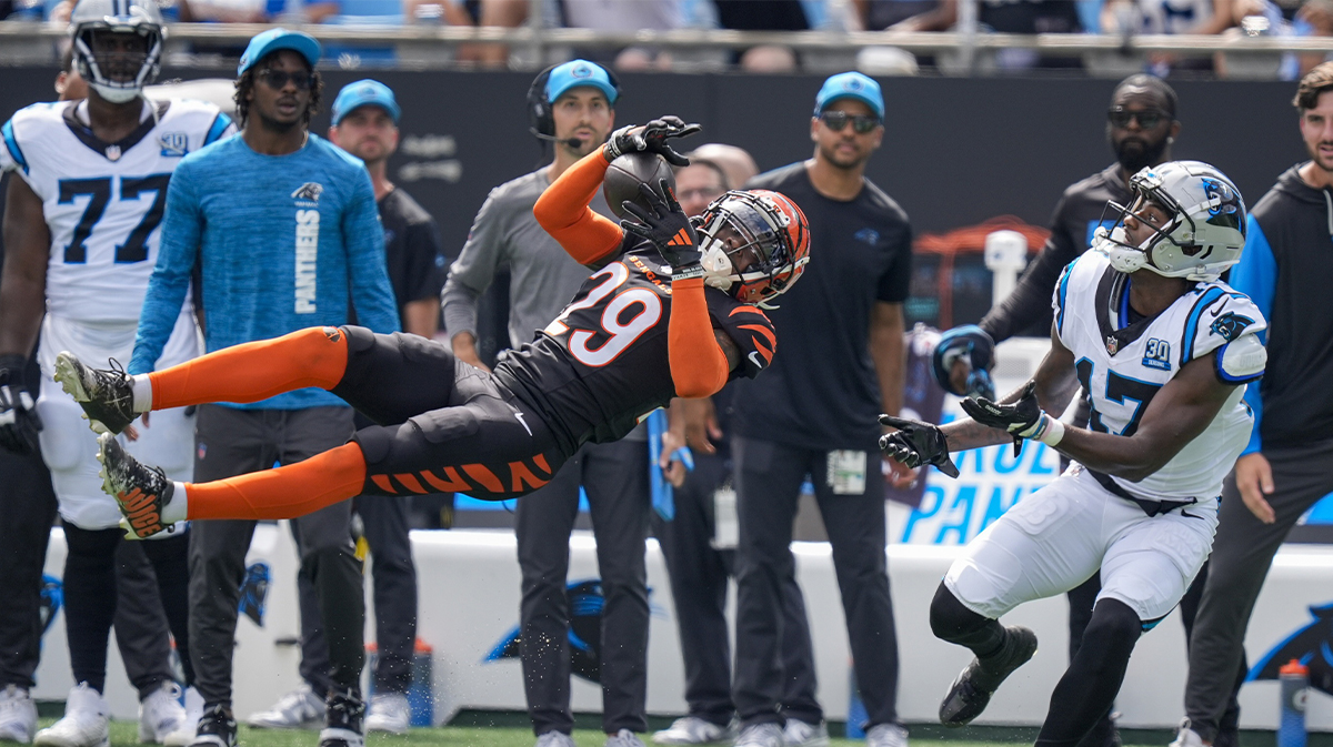 Cincinnati Bengals cornerback Cam Taylor-Britt (29) intercepts a pass meant for Carolina Panthers wide receiver Xavier Legette (17) during the second quarter at Bank of America Stadium.