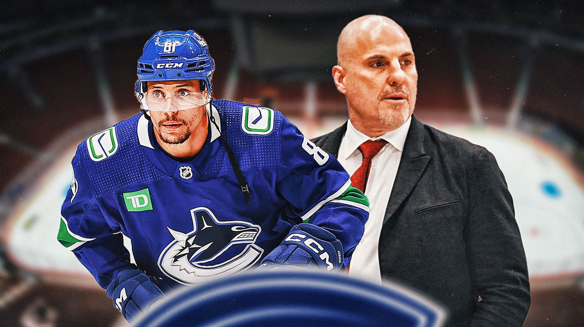 Canucks forward Dakota Joshua and coach Rick Tocchet