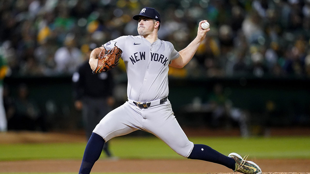 New York Yankees pitcher Carlos Rodon (55) delivers a pitch against the Oakland Athletics in the fifth inning at the Oakland-Alameda County Coliseum.