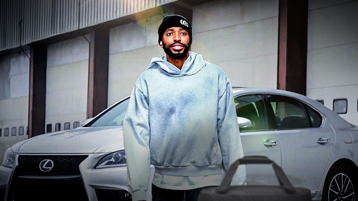 Mikal Bridges in front of a car from his collection.