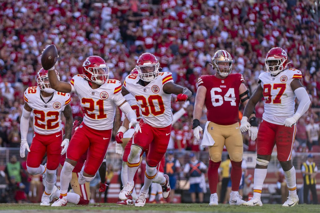 Kansas City Chiefs safety Jaden Hicks (21) celebrates intercepting the football against the San Francisco 49ers during the fourth quarter at Levi's Stadium.