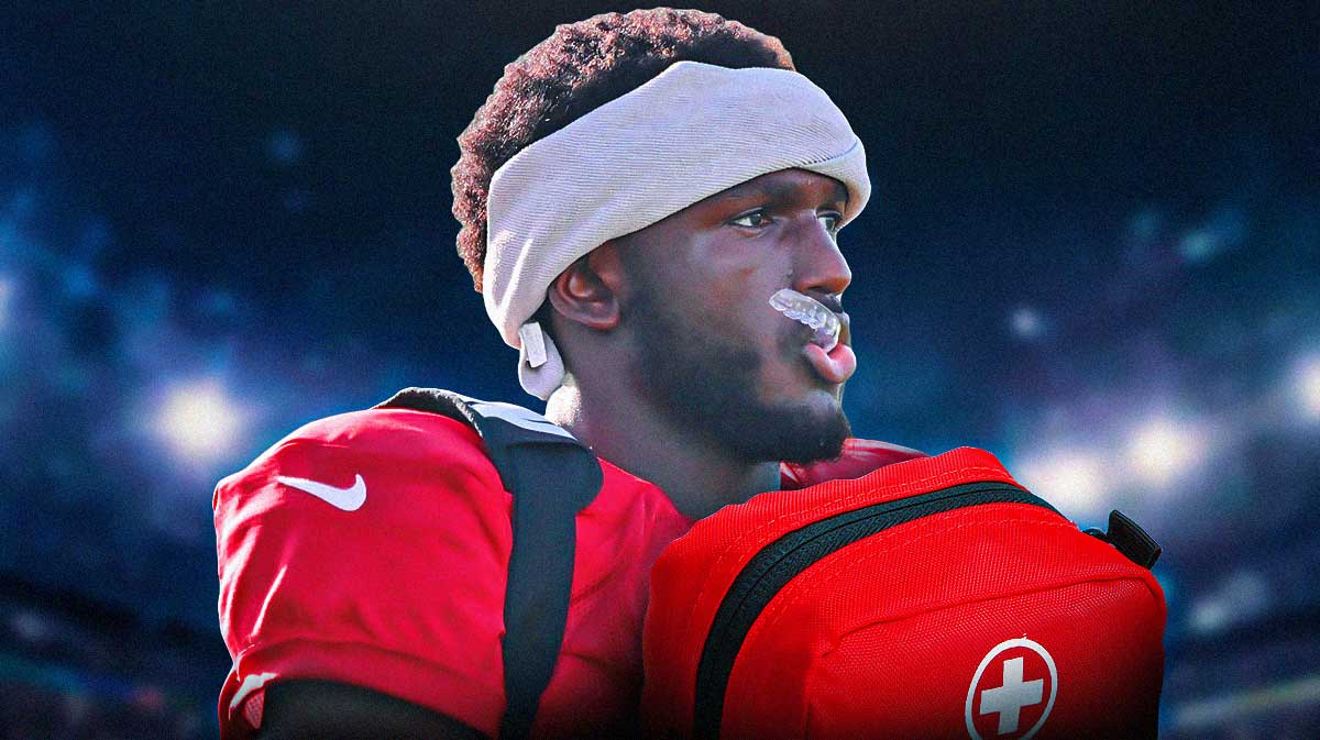 Buccaneers Chris Godwin and red cross