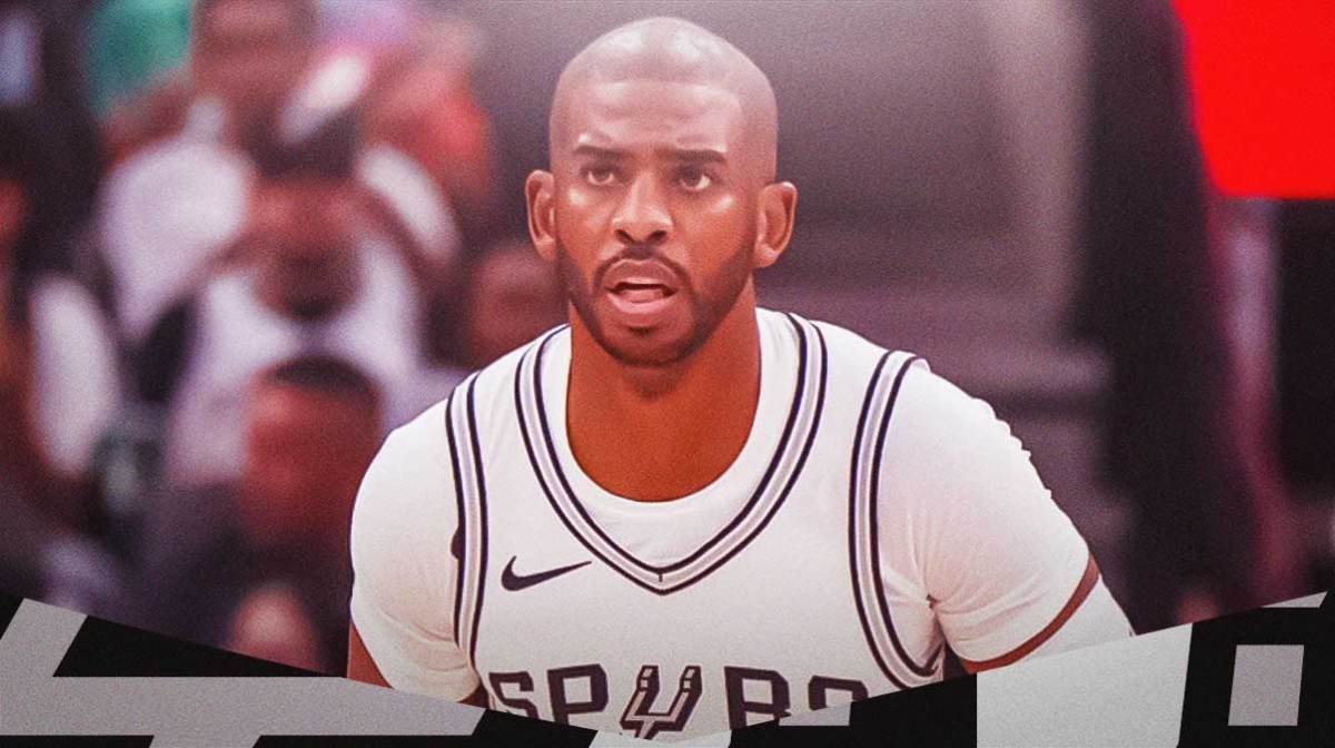 Spurs' Chris Paul looks at Jazz defenders