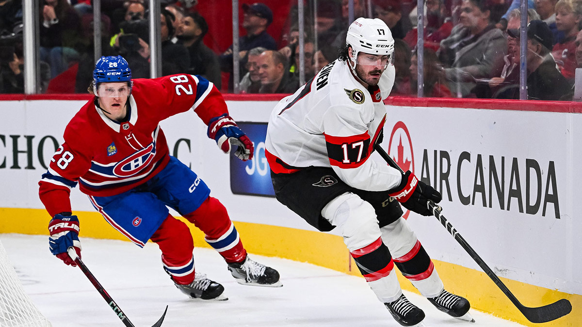 Ottawa Senators right wing Zack MacEwen (17) plays the puck against Montreal Canadiens center Christian Dvorak (28) along the boards during the second period at Bell Centre.