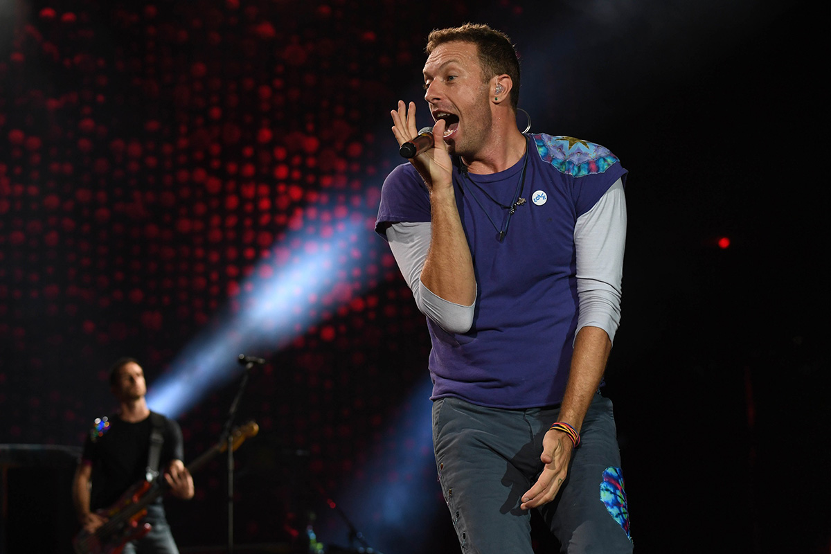 Coldplay's Chris Martin singing at Hard Rock Stadium in Florida in 2017.