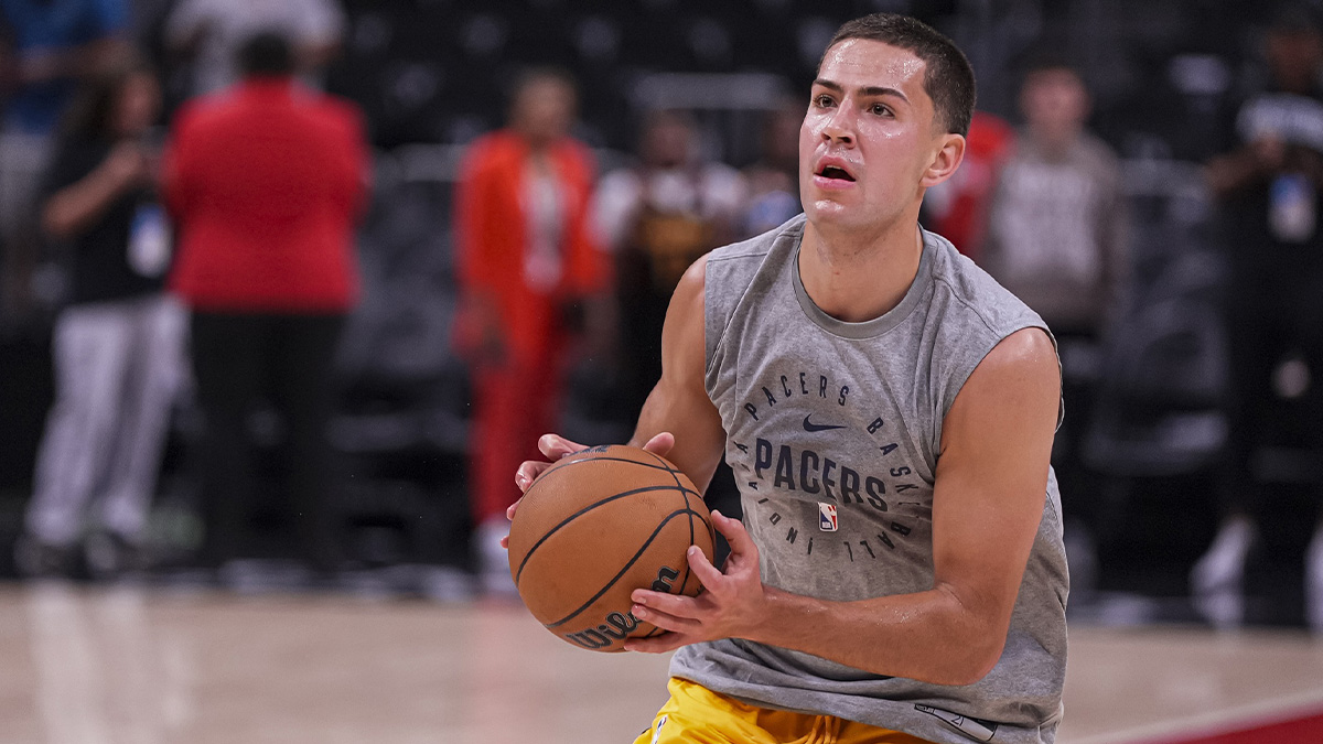 Indiana Pacers forward Cole Swider (21) on the court before the game against the Atlanta Hawks at State Farm Arena.