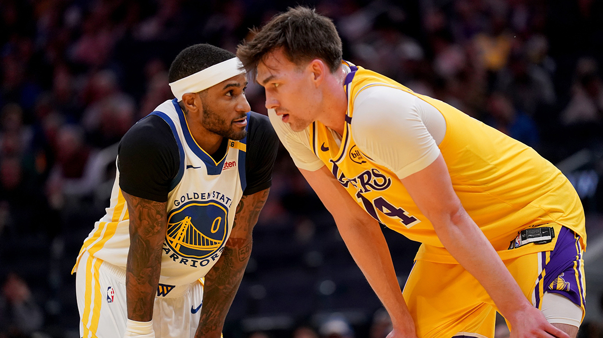 Golden State Warriors guard Gary Payton II (0) stands next to Los Angeles Lakers center Colin Castleton (14) in the third quarter at the Chase Center.