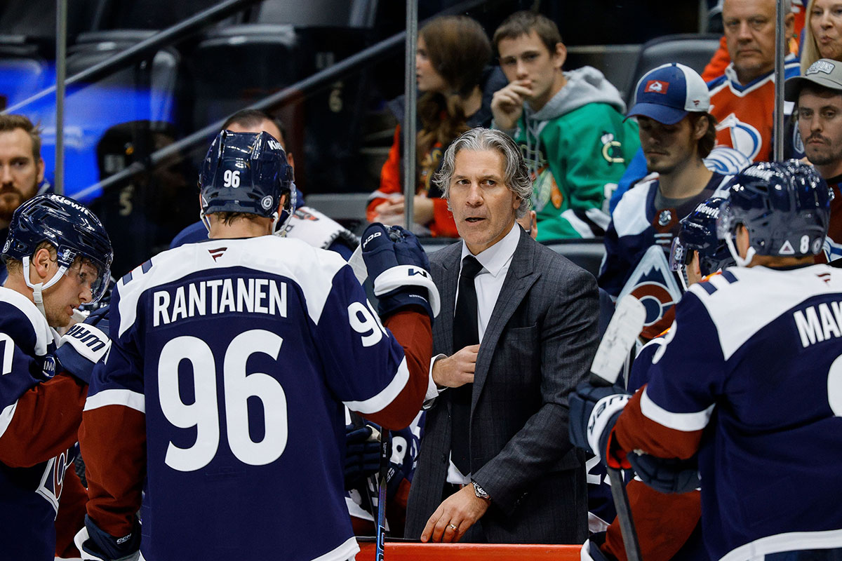 Colorado Avalanche head coach Jared Bednar talks with players in the third period against the Chicago Blackhawks at Ball Arena.