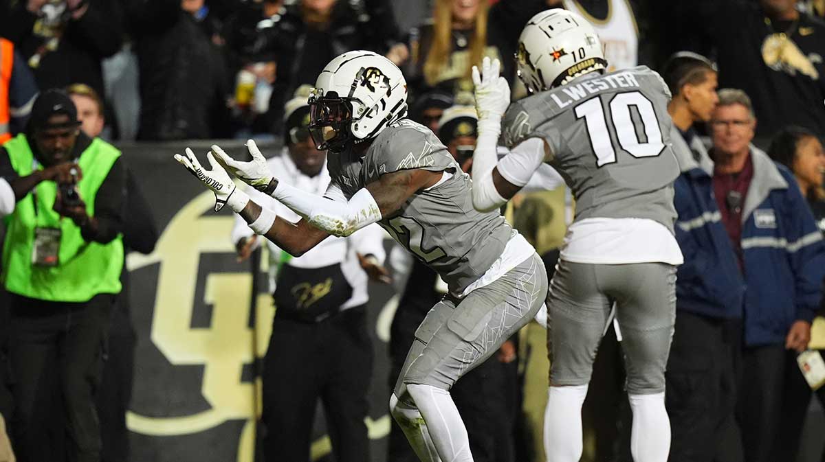 Colorado Buffaloes wide receiver Travis Hunter (12) celebrates his touchdown in the second quarter against the Cincinnati Bearcats at Folsom Field.