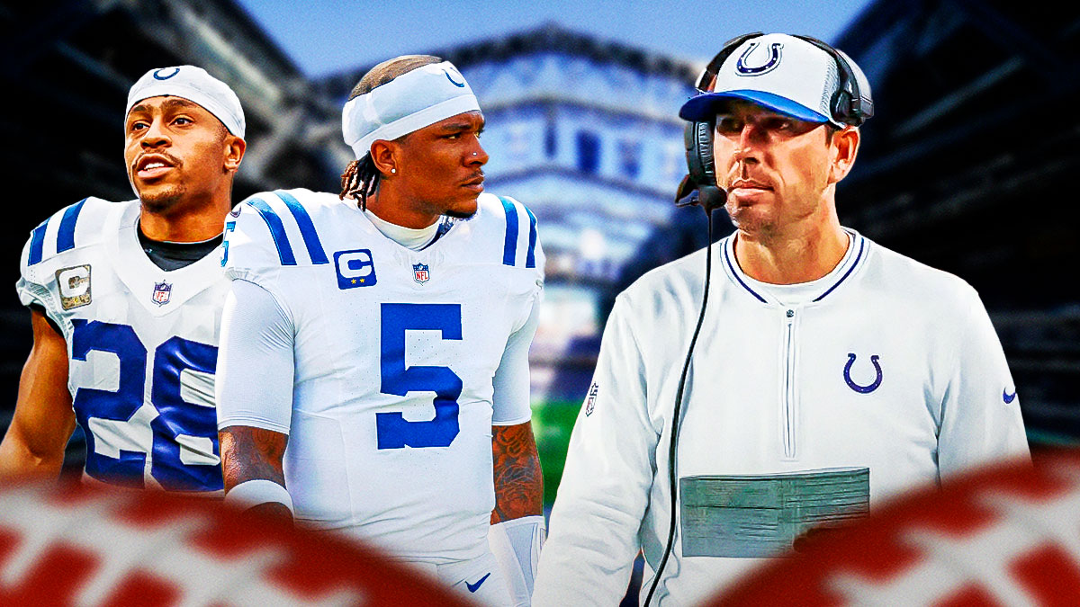 Colts coach Shane Steichen looking at Jonathan Taylor and Anthony Richardson.
