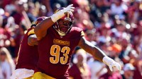 Washington Commanders defensive tackle Jonathan Allen (93) celebrates after a tackle during the second quarter against the Cleveland Browns at NorthWest Stadium