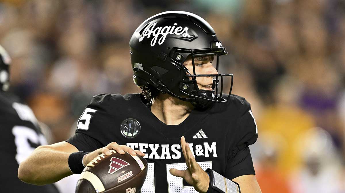 Texas A&M Aggies quarterback Conner Weigman (15) looks to pass the ball in the third quarter against the LSU Tigers at Kyle Field.