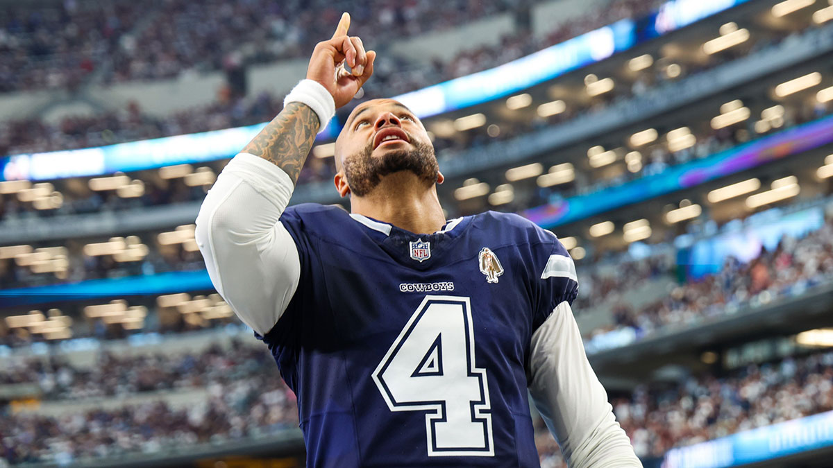 Dallas Cowboys quarterback Dak Prescott (4) prays before the game against the Detroit Lions at AT&T Stadium.