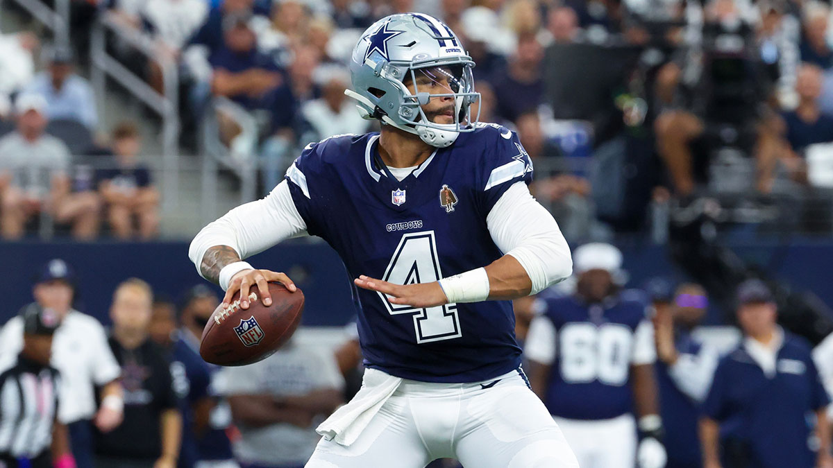 Dallas Cowboys quarterback Dak Prescott (4) throws during the first quarter against the Detroit Lions at AT&T Stadium.