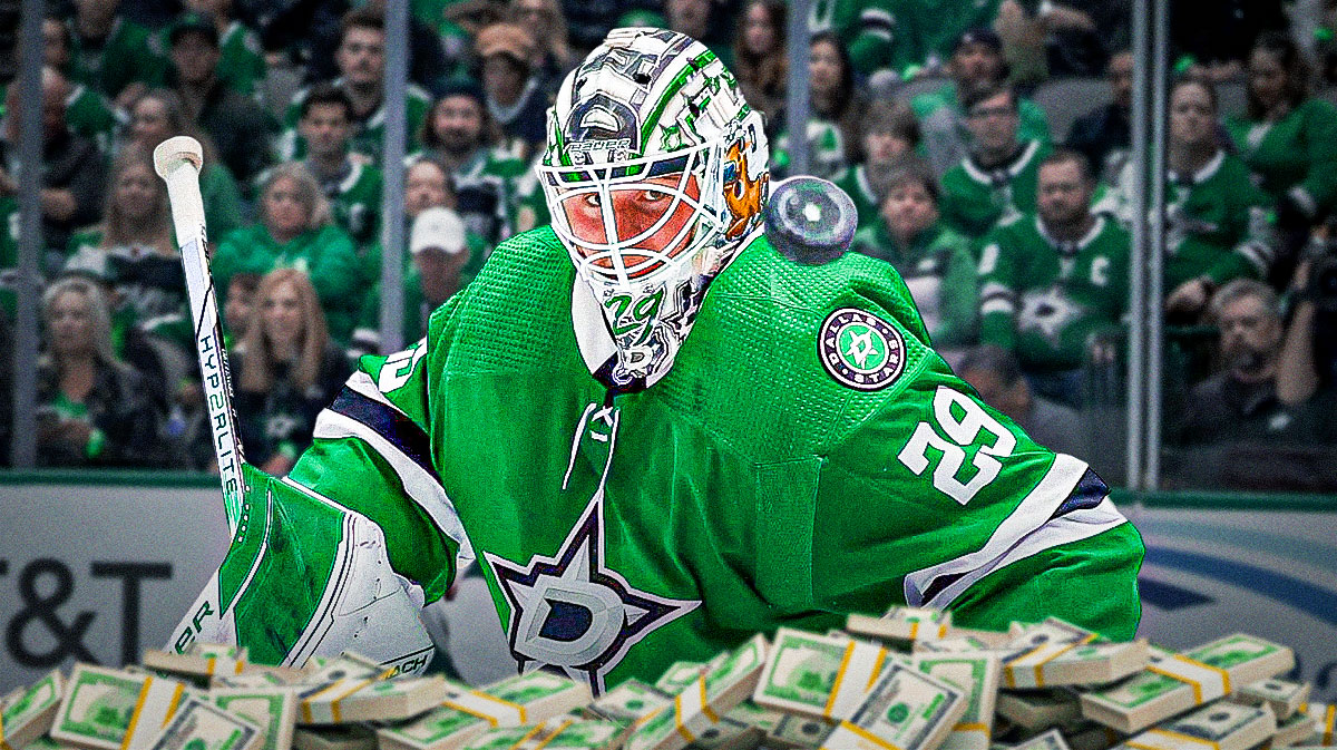 Stars goaltender Jake Oettinger with a giant pile of money
