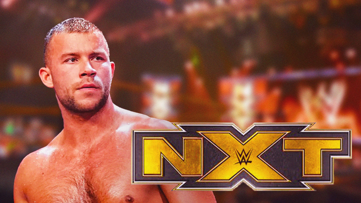 Daniel Garcia next to the NXT logo