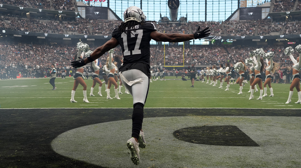 Las Vegas Raiders wide receiver Davante Adams (17) enters the field before the game against the Carolina Panthers at Allegiant Stadium.