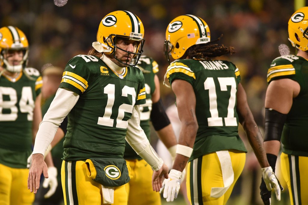 Green Bay Packers quarterback Aaron Rodgers (12) and wide receiver Davante Adams (17) in action against the San Francisco 49ers during a NFC Divisional playoff football game at Lambeau Field.