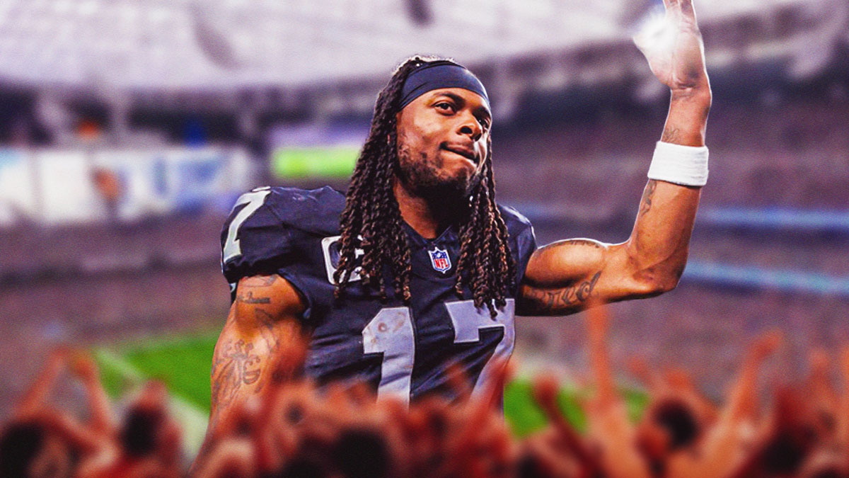 Davante Adams in a Las Vegas Raiders uniform waving as Adams says goodbye to Raiders fans after trade to Jets.