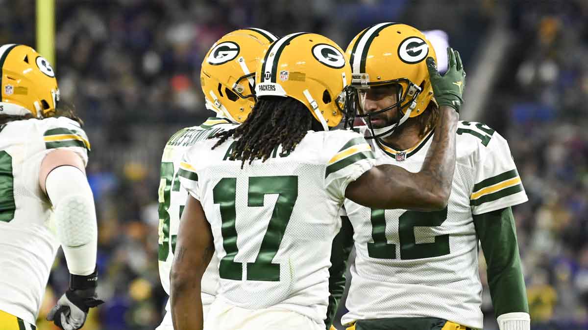 Green Bay Packers wide receiver Davante Adams (17) celebrates with quarterback Aaron Rodgers (12) after scoring a second quarter touchdown against the Baltimore Ravens at M&T Bank Stadium.