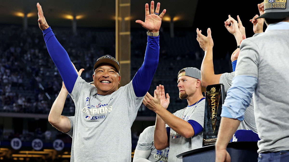 Los Angeles Dodgers manager Dave Roberts (30) celebrates after the Los Angeles Dodgers beat the New York Mets during in six of the NLCS for the 2024 MLB playoffs at Dodger Stadium.