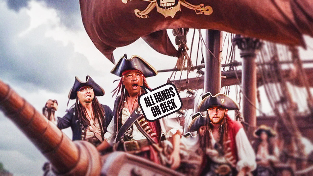 Dodgers’ Dave Robert’s on a pirate ship dressed as a pirate with a bubble quote saying “All Hands on Deck” with Michael Kopech and Blake Treinen as his crew mates