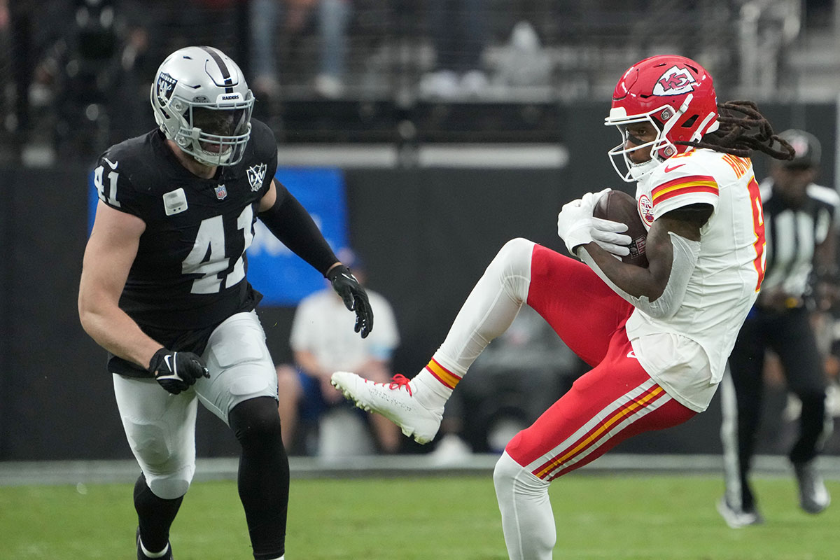 Oct 27, 2024; Paradise, Nevada, USA; Kansas City Chiefs wide receiver DeAndre Hopkins (8) catches the ball against Las Vegas Raiders linebacker Robert Spillane (41) in the first half at Allegiant Stadium.