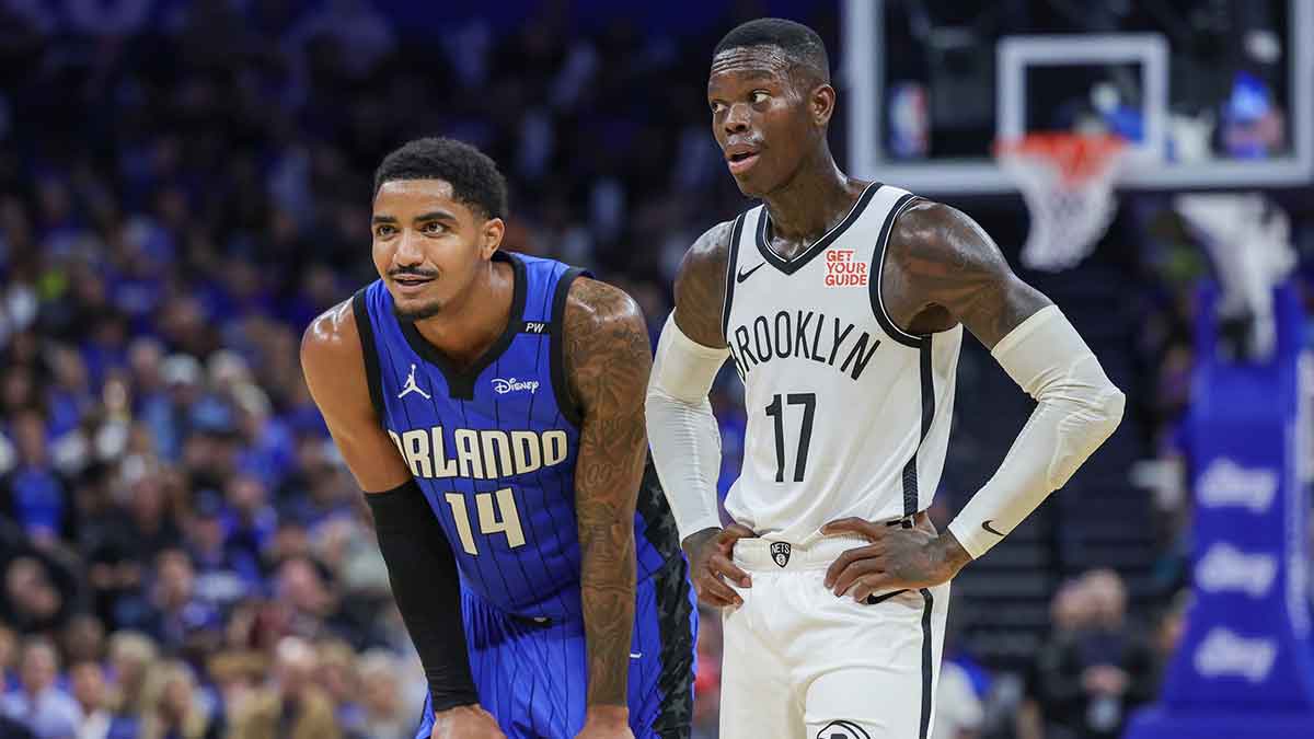 Orlando Magic guard Gary Harris (14) and Brooklyn Nets guard Dennis Schroder (17) wait for the free throw during the second half at Kia Center.
