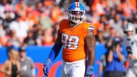 Denver Broncos defensive end John Franklin-Myers (98) reacts to a defensive stop in the second half against the Las Vegas Raiders at Empower Field at Mile High