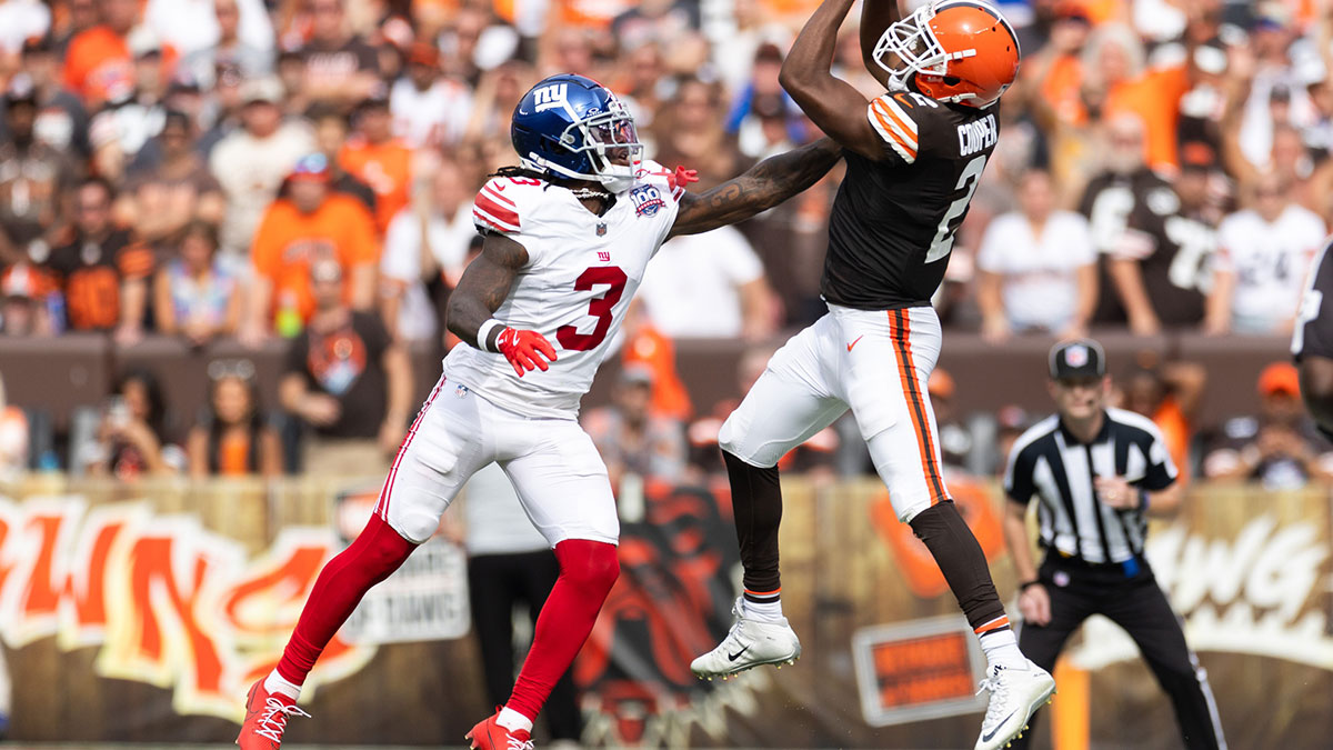 Sep 22, 2024; Cleveland, Ohio, USA; Cleveland Browns wide receiver Amari Cooper (2) catches the ball under coverage by New York Giants cornerback Deonte Banks (3) during the fourth quarter at Huntington Bank Field.