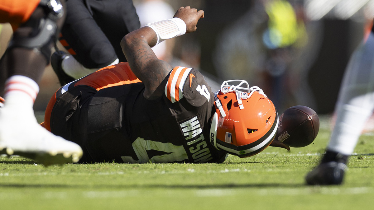 Cleveland Browns quarterback Deshaun Watson (4) falls to the ground with a torn Achilles during the second quarter against the Cincinnati Bengals at Huntington Bank Field.