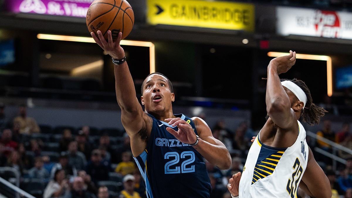 Memphis Grizzlies guard Desmond Bane (22) shoots the ball while Indiana Pacers center Myles Turner (33) defends in the first quarter at Gainbridge Fieldhouse. 