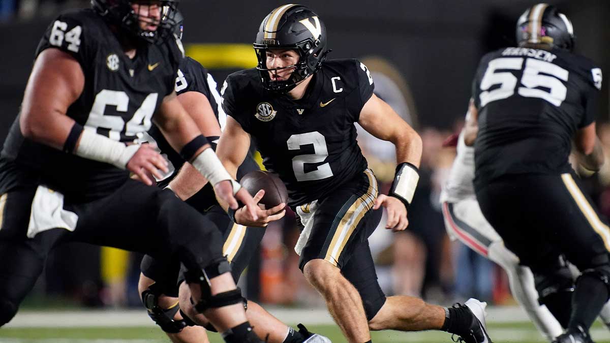 Vanderbilt quarterback Diego Pavia (2) runs the ball against Ball State during the fourth quarter at FirstBank Stadium