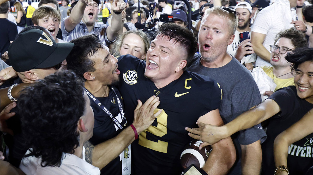 Vanderbilt Commodores quarterback Diego Pavia celebrates with fans after defeating the Alabama Crimson Tide at FirstBank Stadium.