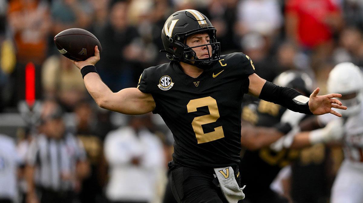 Vanderbilt Commodores quarterback Diego Pavia (2) scrambles against the Texas Longhorns during the first half at FirstBank Stadium.