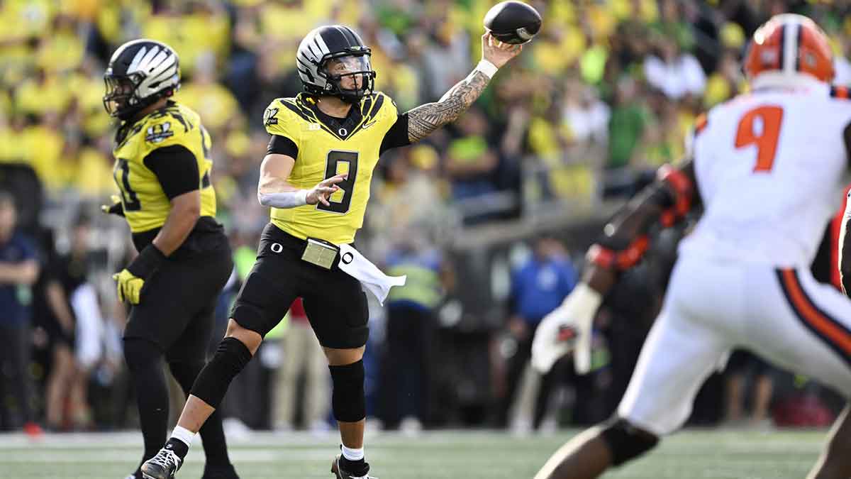 Oregon Ducks quarterback Dillon Gabriel (8) throws a pass during the second half against the Illinois Fighting Illini at Autzen Stadium.