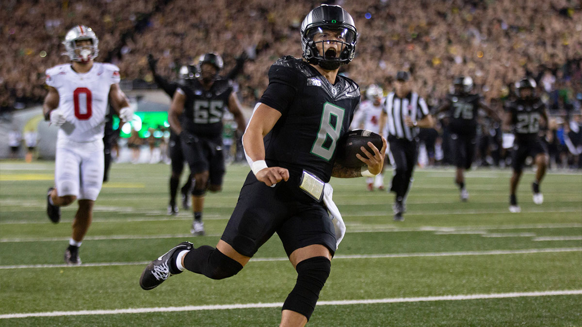 Oregon quarterback Dillon Gabriel scores a touchdown against Ohio State in the fourth quarter at Autzen Stadium Saturday, Oct. 12, 2024.
