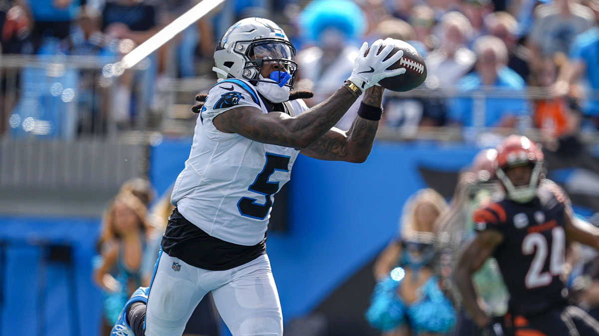 Carolina Panthers wide receiver Diontae Johnson (5) catches a pass from quarterback Andy Dalton (14) for a touchdown during the third quarter at Bank of America Stadium.