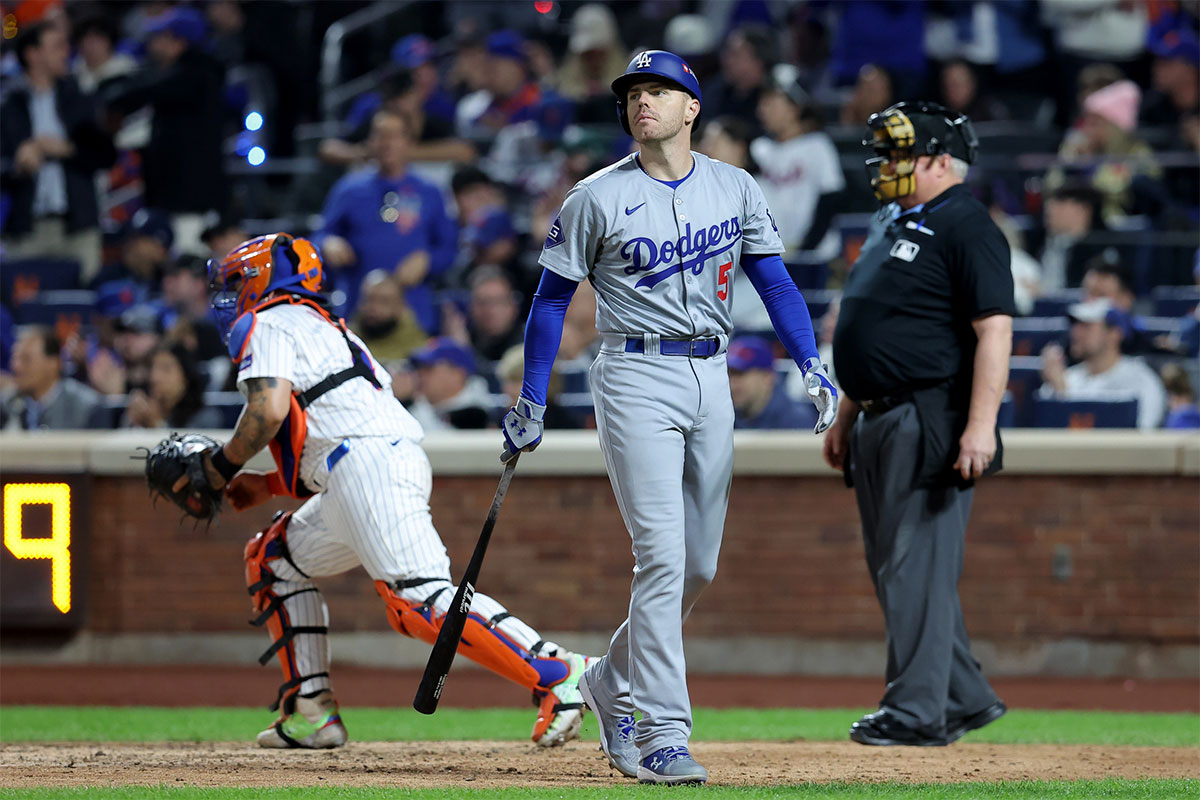 Los Angeles Dodgers first baseman Freddie Freeman (5) reacts after striking out to end the top of the sixth inning of game five of the NLCS against the New York Mets during the 2024 MLB playoffs at Citi Field