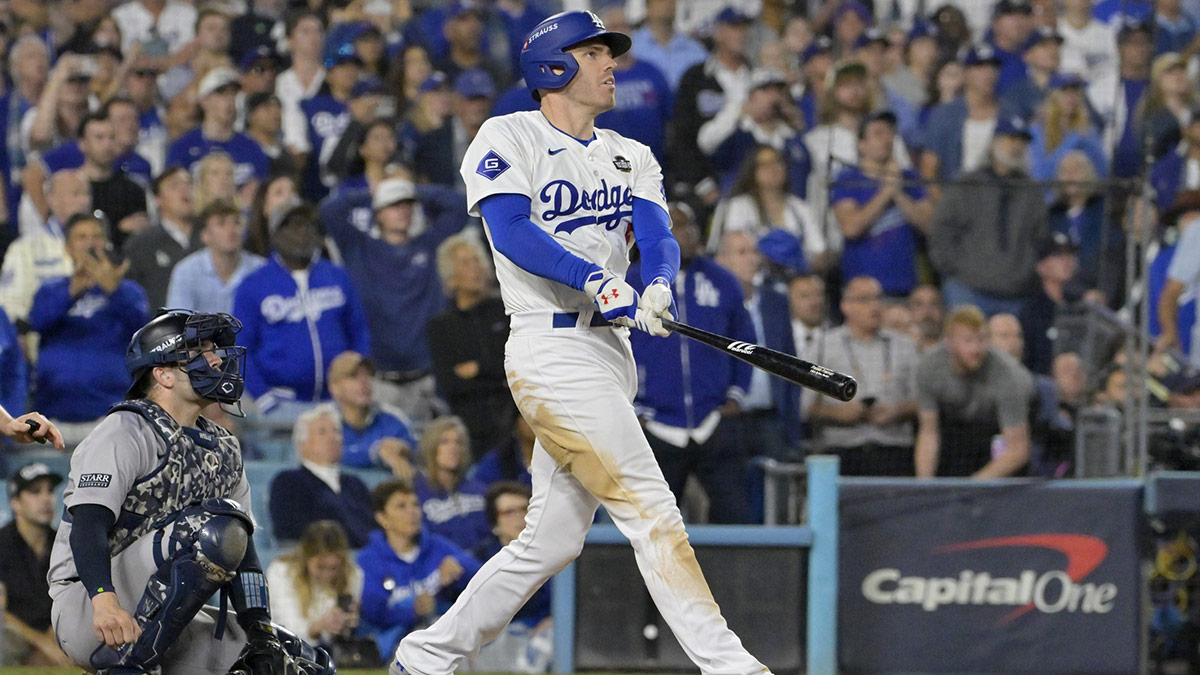 Los Angeles Dodgers first baseman Freddie Freeman (5) hits a grand slam home run in the tenth inning against the New York Yankees during game one of the 2024 MLB World Series at Dodger Stadium