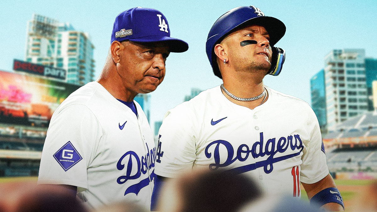 Miguel Rojas (Dodgers) in pain, Dave Roberts (Dodgers manager) looking concerned.