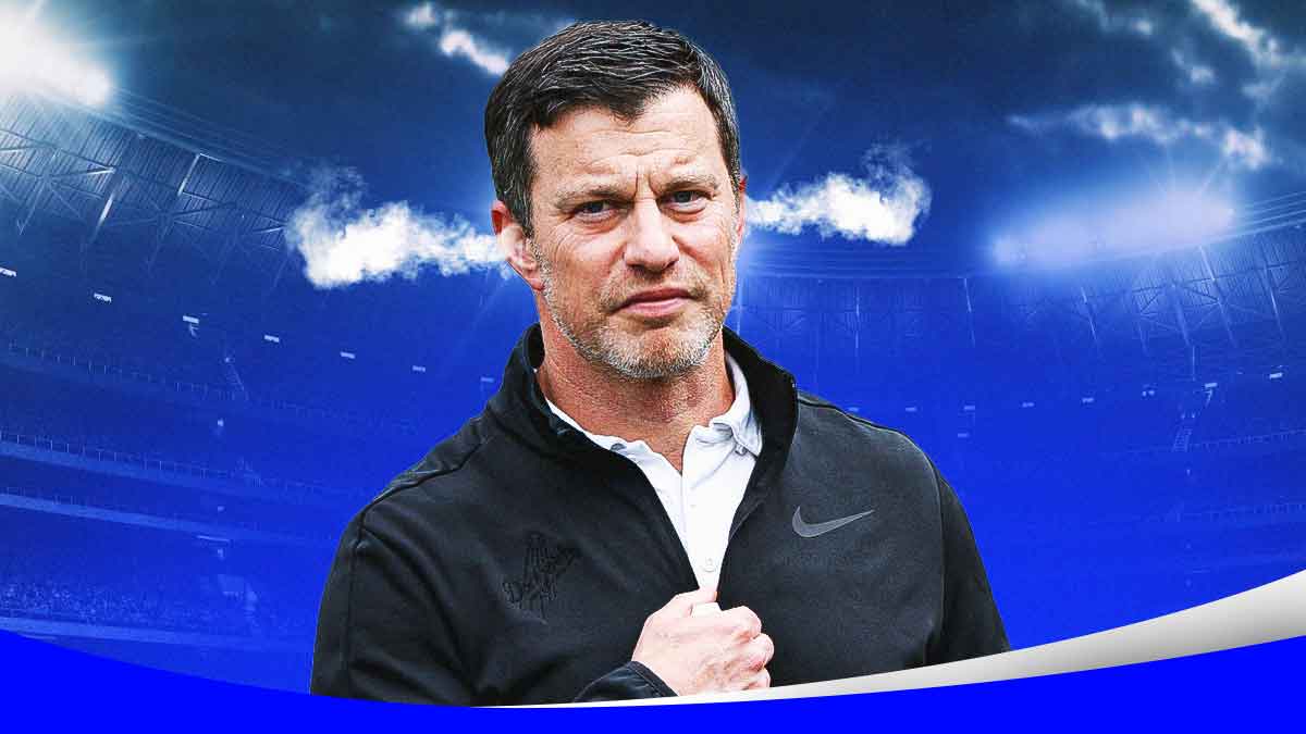 Dodgers Andrew Friedman with smoke coming out of his ears looking upset.