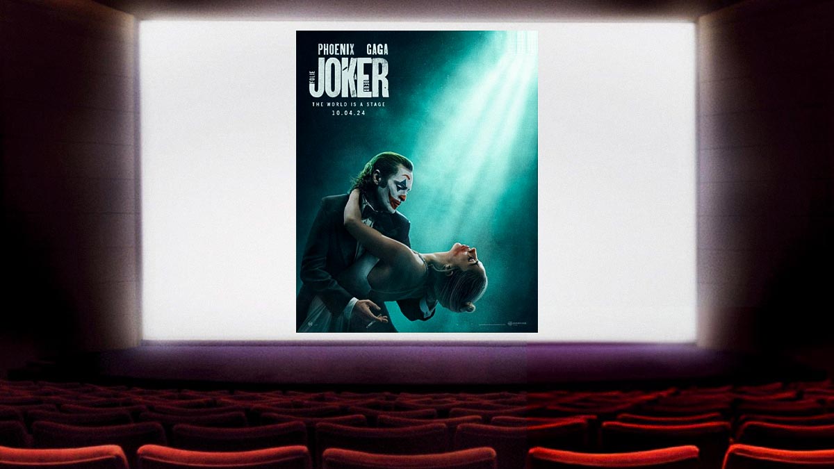 Joker: Folie à Deux poster on movie theater screen.